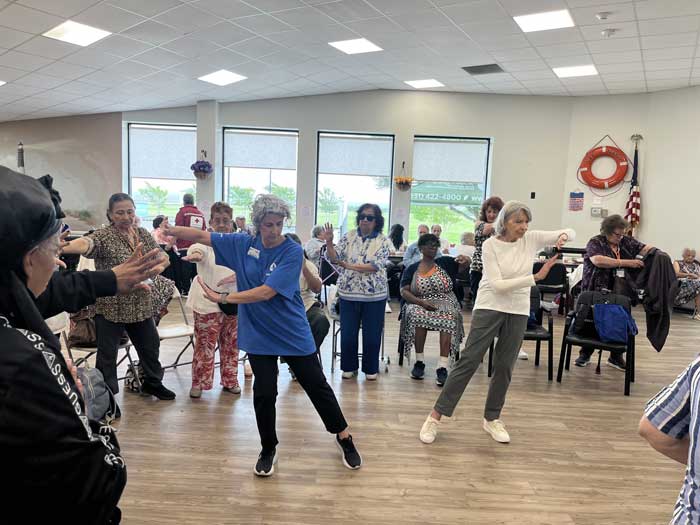 Seniors doing Tai Chi in class