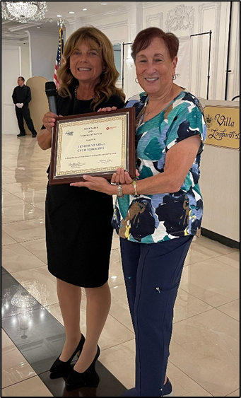 Tender Years craft group receiving a reward